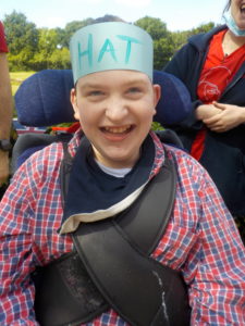 Student outdoors wearing hat at Ingfield Manor School