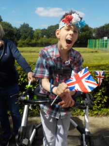 Young person with flag celebrating jubilee